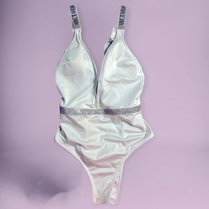 Victoria’s Secret one piece white swim suit. Wore once. Super cute rhinestone.